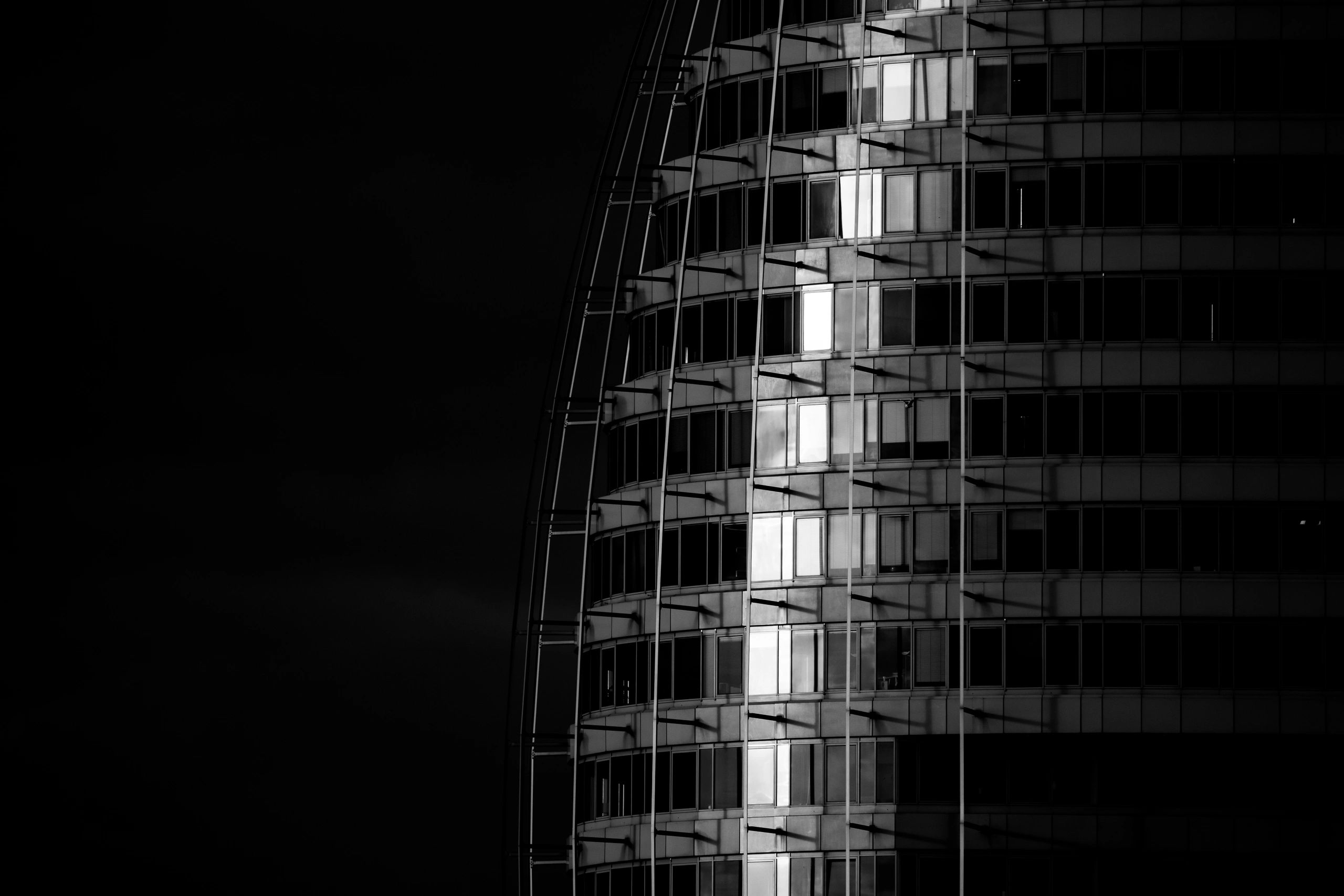 Reflective architectural facade detail for premium design call to action